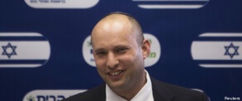Bennett smiles during a Jewish Home party meeting, at the Knesset, the Israeli parliament, in Jerusalem